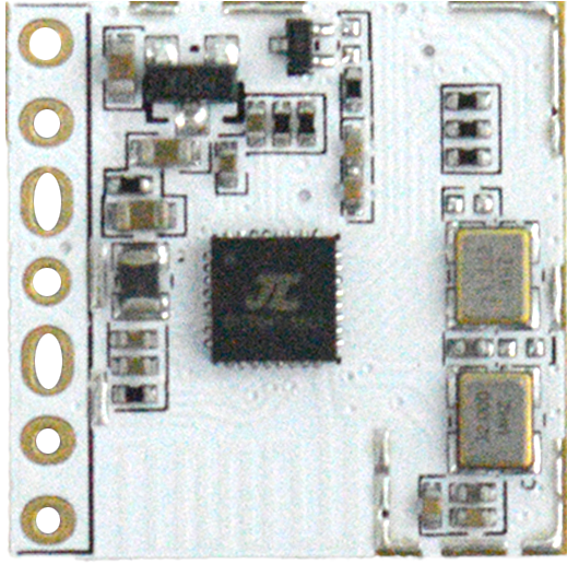 RA24D18 24GHz Presence Sensor Module – Bluetooth Version 5.0, Human Detection & Occupancy Monitoring - a close-up of a white rectangular circuit board with a central black chip, two gold oscillators, and side pins.