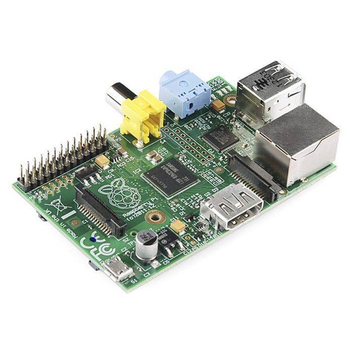 Raspberry Pi 1 Model b - a yellow RCA port, blue audio jack, USB port, Ethernet port, HDMI port, and micro-USB power input.