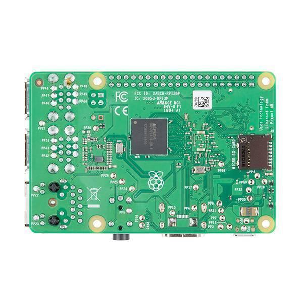 Raspberry Pi 3 B+ - shown from the back, featuring a green circuit board with an Elpida memory chip, a micro SD card slot, and various test points.