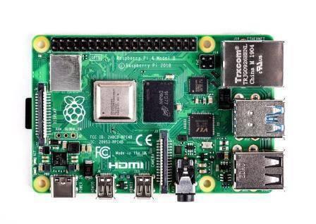 Raspberry Pi 4 2GB RAM - a green circuit board featuring a GPIO header, Ethernet port, two USB 3.0 ports, two USB 2.0 ports, and HDMI connectors.