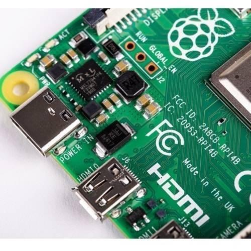 Raspberry Pi 4 4GB RAM - a close-up view of the green circuit board showing the USB-C power port, HDMI port, and various electronic components.