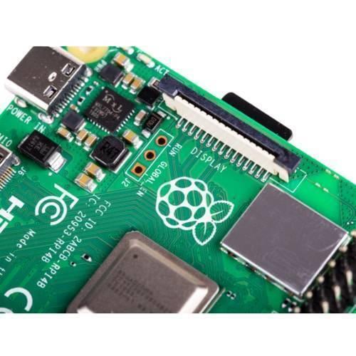 Raspberry Pi 4 4GB RAM - a close-up view of the green circuit board showing the display connector, power input, and the Raspberry Pi logo.