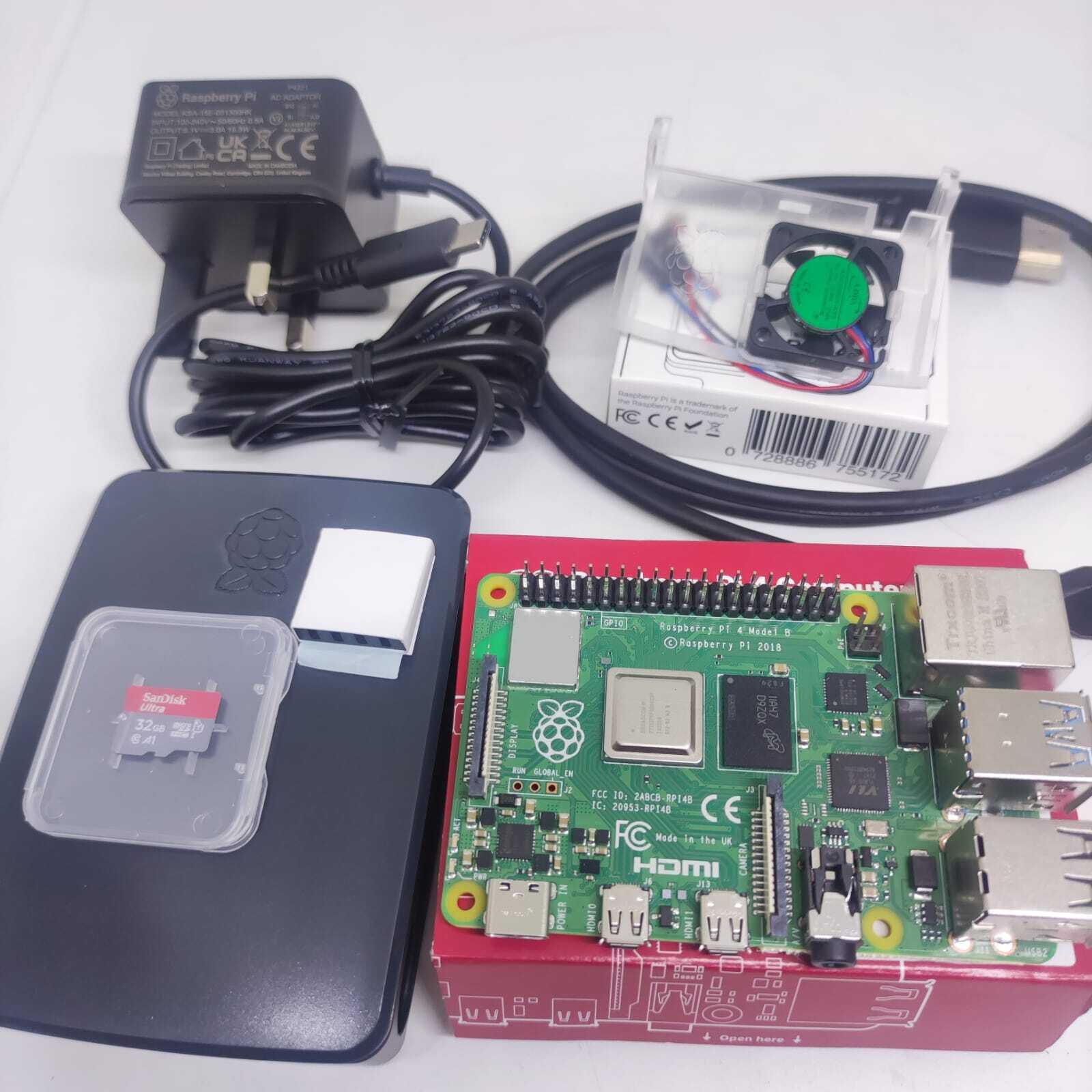Raspberry Pi 4 4GB RAM Starter Kit - a circuit board, black power adapter, SanDisk 32GB microSD card, cooling fan, and cables on a red box.