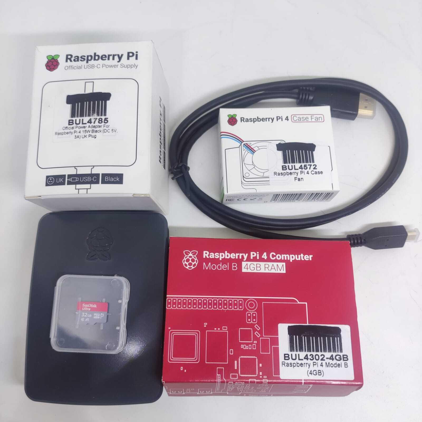 Raspberry Pi 4 4GB RAM Starter Kit - a computer box, power supply, fan, micro SD card, and HDMI cable arranged on a white surface.