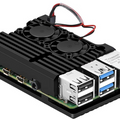 Raspberry Pi 4 Aluminum Heatsink Case with Dual Fan - Digilog.pk - a black metal enclosure with two fans, USB ports, an Ethernet port, and side-mounted ports.