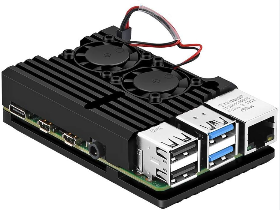 Raspberry Pi 4 Aluminum Heatsink Case with Dual Fan - Digilog.pk - a black metal enclosure with two fans, USB ports, an Ethernet port, and side-mounted ports.
