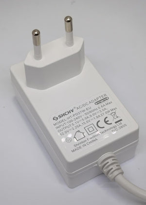 Raspberry Pi 5 27W USB-C PD Power Supply 5.1V 5A Adapter Pakistan - a white AC/DC adapter with a two-pin EU plug and an attached white power cable.
