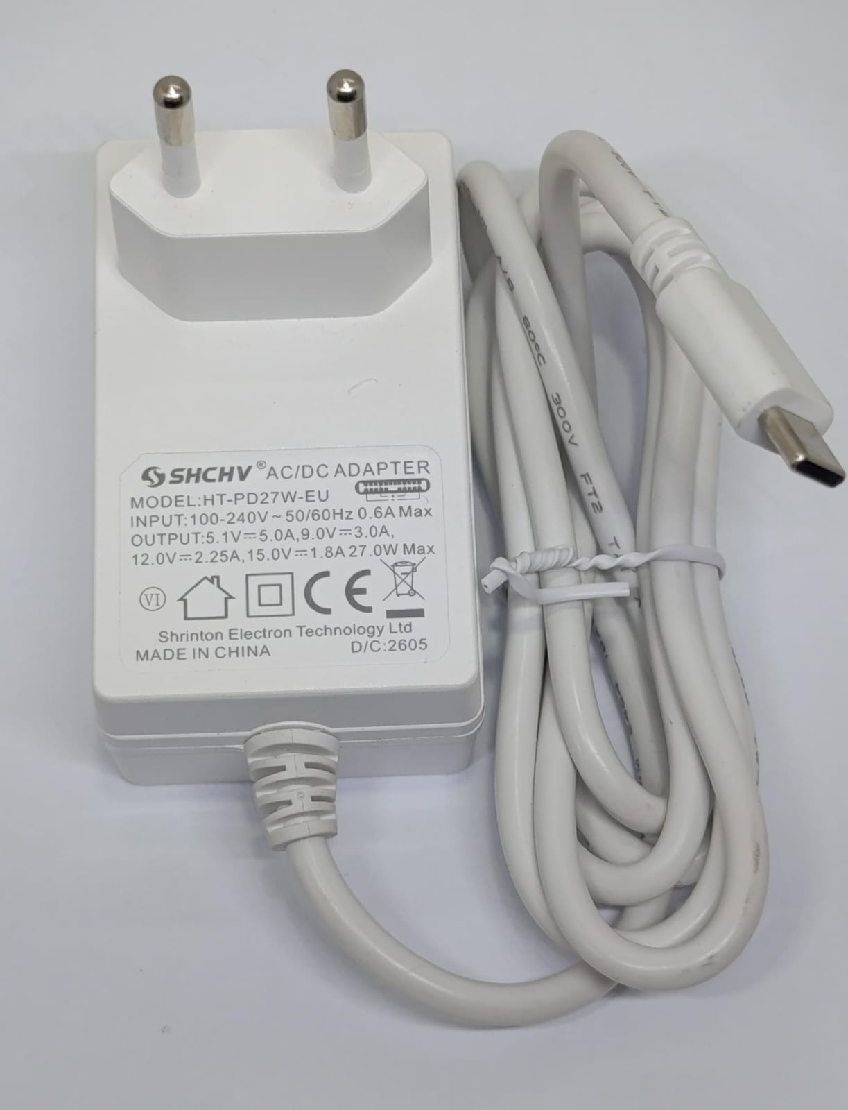 Raspberry Pi 5 27W USB-C PD Power Supply 5.1V 5A Adapter Pakistan - a white wall adapter with a two-pin EU plug and an attached USB-C cable.