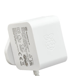 Raspberry Pi 5: Official 27W 5.1V 5A USB-C Power Supply - a white, square-shaped wall adapter showing printed technical specifications and the Raspberry Pi logo.