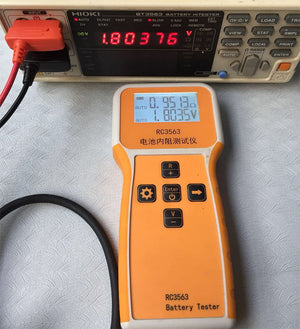 RC3563 Battery Internal Resistance Tester - shown with a Hioki BT3563, displaying 0.951mΩ and 1.8035V on its screen alongside the Hioki's 1.80376V reading.