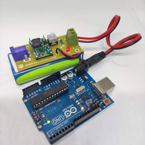 Rechargeable Battery Pack For Arduino And Robot Power Supply With Charger - a green battery, a yellow power module, and a blue Arduino Uno.