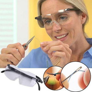 Rechargeable LED Magnifying Glasses - shown being worn by a woman, with a separate view of the glasses and close-ups of needlework and fly tying.