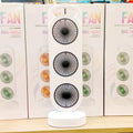 Rechargeable Triple Circulation Wind Fan price - shown as a white, vertical, three-fan unit standing in front of four identical product boxes on a shelf.