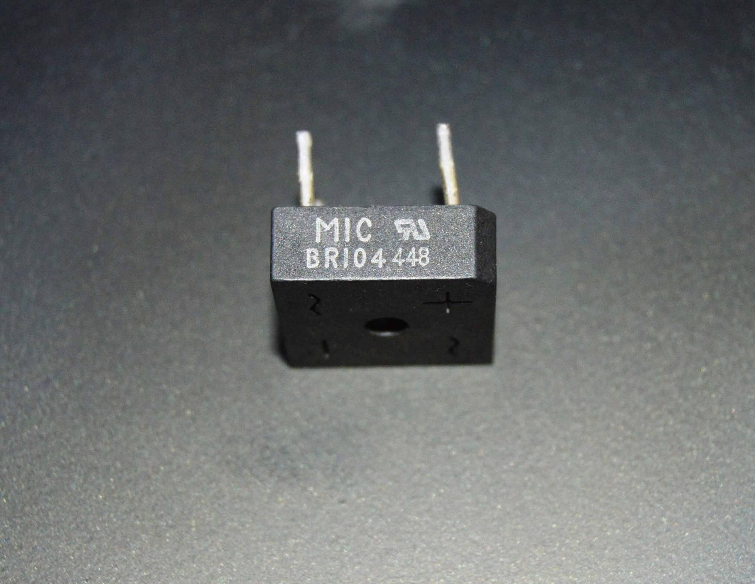 Rectron Bridge Ractifier BR104 (used Condition) - a black square-shaped electronic component with four metal pins and printed text including MIC and BR104 448.