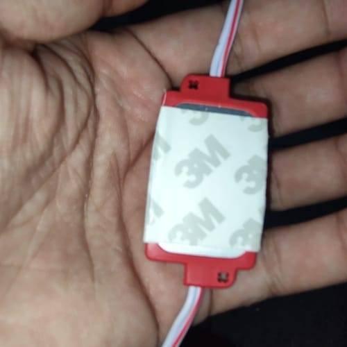 Red Color 12V 1.5W LED Module Self Adhesive Light - a close-up view of a rectangular red LED module with a 3M adhesive backing and attached white wires.