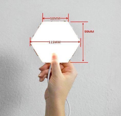 Red Touch Light Wall Mount Magnetic Modular (1pc) - shown being held by a hand, featuring a white hexagonal shape with overlaid red dimension lines.
