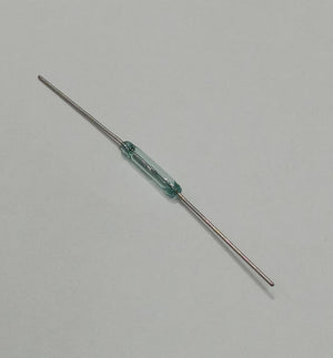 Reed Switch Sensor Reed Sensor Magneto Magnet Magnetic Switch Normally Close - a small, clear glass cylindrical component with two thin metal leads extending from opposite ends, isolated on a white background.