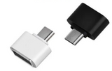 Remax OTG Type c OTG For Android Type For All Android USB Converter For Smartphones - one white and one black USB-C to USB-A adapter connector side-by-side.