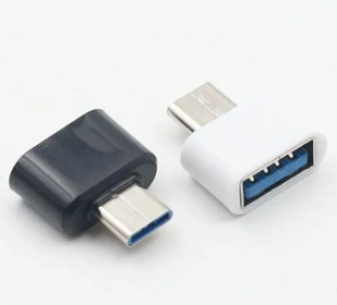 Remax OTG Type c OTG For Android Type For All Android USB Converter For Smartphones - one black and one white USB-C to USB-A adapter connector, each with a male USB-C plug and a female USB-A port.