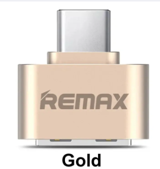 Remax OTG Type c OTG For Android Type For All Android USB Converter For Smartphones - a gold-coloured USB converter with a Type-C connector on top and a female USB port on the bottom.