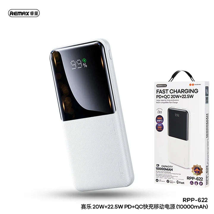 Remax RPP-622 20W+22.5W pd+QC fast power bank 10000mAh - with a black display showing 99%, positioned next to its retail packaging box featuring the product image.