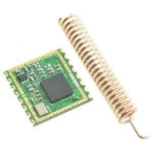 Retired Product 433MHz Lora SX1278 With Antenna XL1278 SMT SPI Interface Long Range Transceiver Wireless Module - a green square circuit board with a black integrated circuit and a separate coiled copper wire antenna.