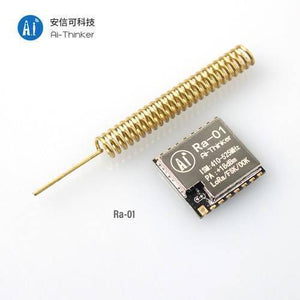 Retired Product Lora Ra-01 433MHz SX1278 Long Range Wireless Module - shown with its square metallic chip and a separate gold-coloured coiled wire antenna.