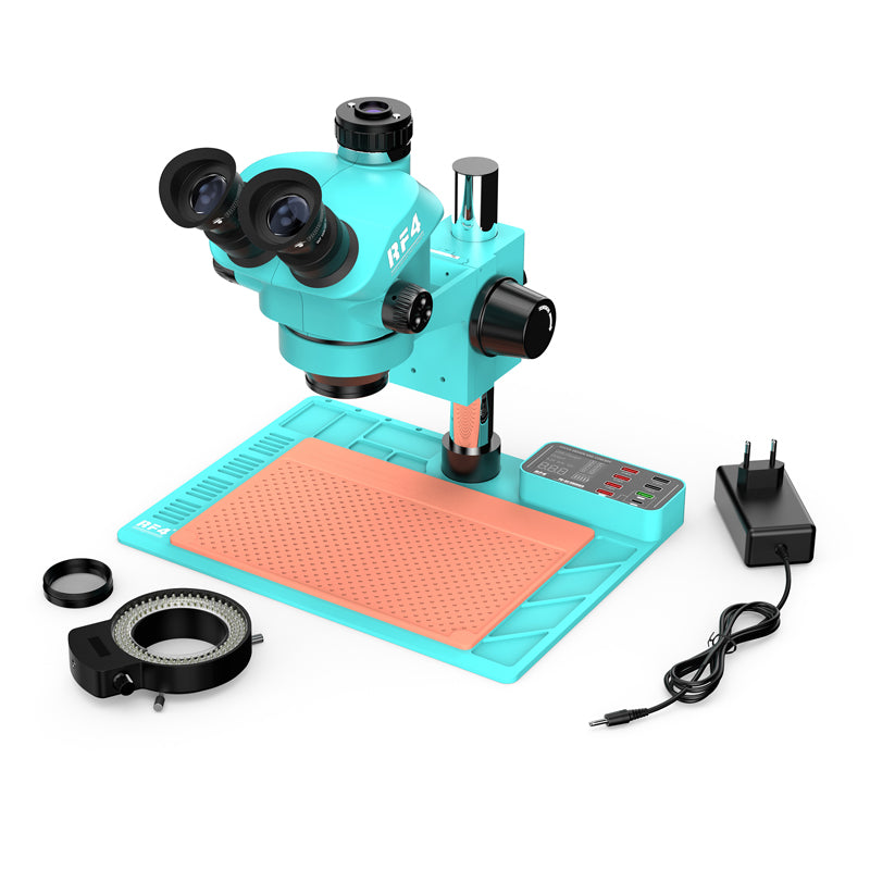 RF4 RF-7050TVA9 7X-50X Synchronous Zoom Trinocular Stereo Microscope with USB Charging Station - work mat, integrated USB charging station, ring light, and power adapter on a white background.
