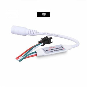 RGB LED Pixel Strip Lights Wireless Remote Controller For WS2811 SK6812 WS2812B 6803 1903 - a white mini RF controller with a DC power input jack and a three-wire output connector.