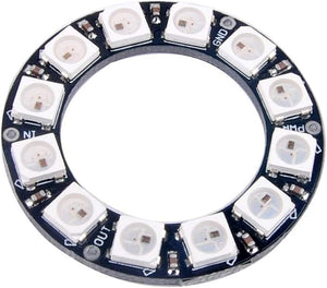 RGB LED Ring 12Bit WS2812 5050 Integrated Driver Module for Arduino - a circular black PCB featuring twelve white LEDs with labeled GND, PWR, IN, and OUT ports.
