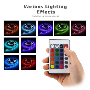RGB LED Strip With Remote And Power Supply White Background 12V 5meter 24 Key Remote - hand holding a 24-key remote control next to eight square panels displaying the strip in various colors.