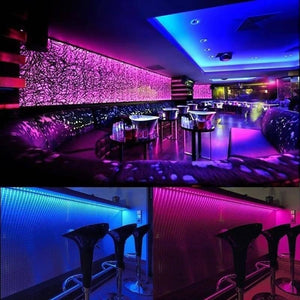 RGB LED Strip With Remote And Power Supply White Background 12V 5meter 24 Key Remote - a nightclub interior and a bar counter illuminated by blue and pink LED strip lighting.