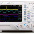 Rigol DS1104Z 100 MHz 4-channel digital oscilloscope front panel showing four waveforms