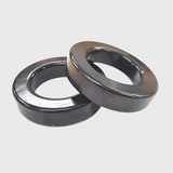 ring 2 inch for local inverter - two black, circular, smooth-surfaced toroidal cores with the text MZS778060 engraved on their sides.