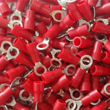 Ring Type Cable Lugs O Type Thimble Cable lug tubular, M3mm, 0.25-1.5MM2 Copper Terminal - a pile of red insulated circular copper terminal connectors with small ring-shaped ends.