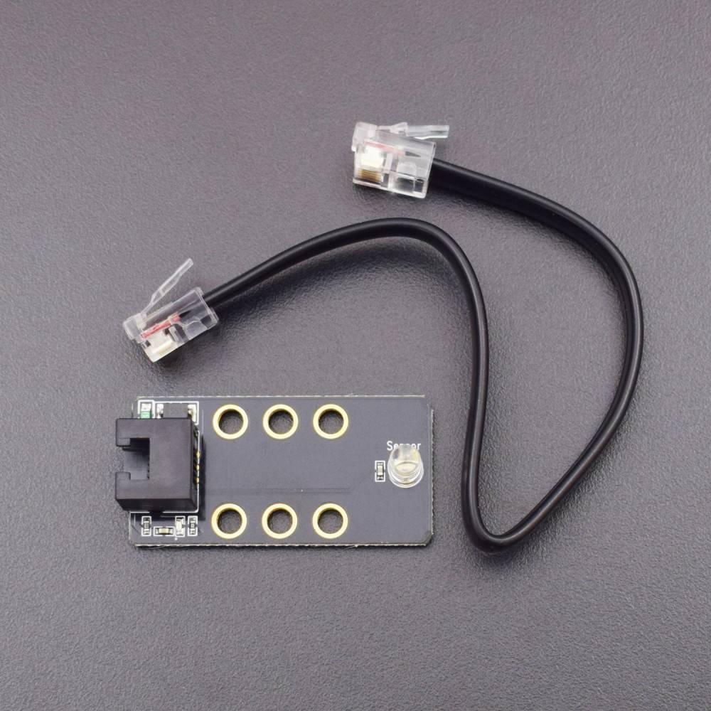 Robobloq Light Sensor With RJ11 Connecting Wire - a small black rectangular circuit board with a sensor, a black RJ11 port, and a black cable.