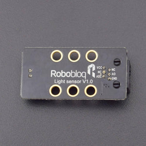 Robobloq Light Sensor With RJ11 Connecting Wire - a black rectangular circuit board with six mounting holes and labels for VCC, NC, ADC, AO, and GND pins.