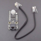 Robobloq PIR Motion Sensor With RJ11 Connecting Wire - a black rectangular sensor module with a white dome, an RJ11 port, and a black RJ11 cable.