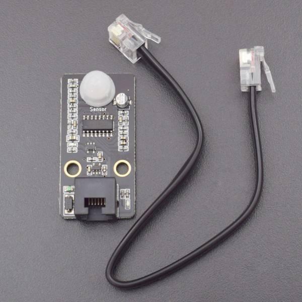 Robobloq PIR Motion Sensor With RJ11 Connecting Wire - a black rectangular sensor module with a white dome, an RJ11 port, and a black RJ11 cable.