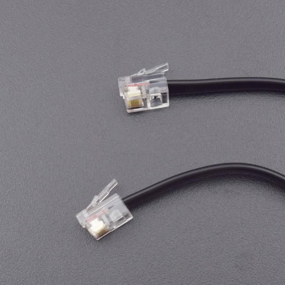 Robobloq PIR Motion Sensor With RJ11 Connecting Wire - a close-up of a black cable with two clear RJ11 modular connectors at each end.