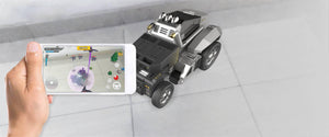 Robosen T9 - Advanced Programmable And Convertible Robot - STEM: Fun, Educational With Voice And App Control - a black and silver programmable robot, is shown being controlled by a smartphone app displaying a game interface.