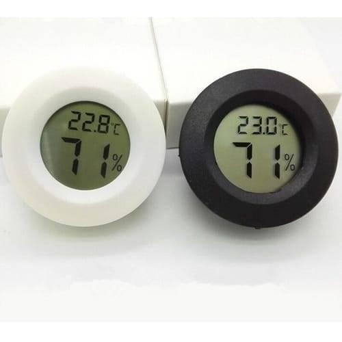 Round LCD Hygrometer Thermometer Temperature Humidity Meter - one white and one black circular unit with digital displays reading 22.8°C/71% and 23.0°C/71%.