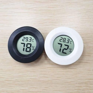 Round LCD Hygrometer Thermometer Temperature Humidity Meter - digital displays of 29.3°C/78% and 28.3°C/72% on a wooden surface.