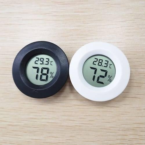 Round LCD Hygrometer Thermometer Temperature Humidity Meter - digital displays of 29.3°C/78% and 28.3°C/72% on a wooden surface.