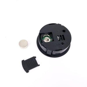 Round LCD Hygrometer Thermometer Temperature Humidity Meter - shown from the back with its circular black casing, battery compartment, coin cell, and cover.