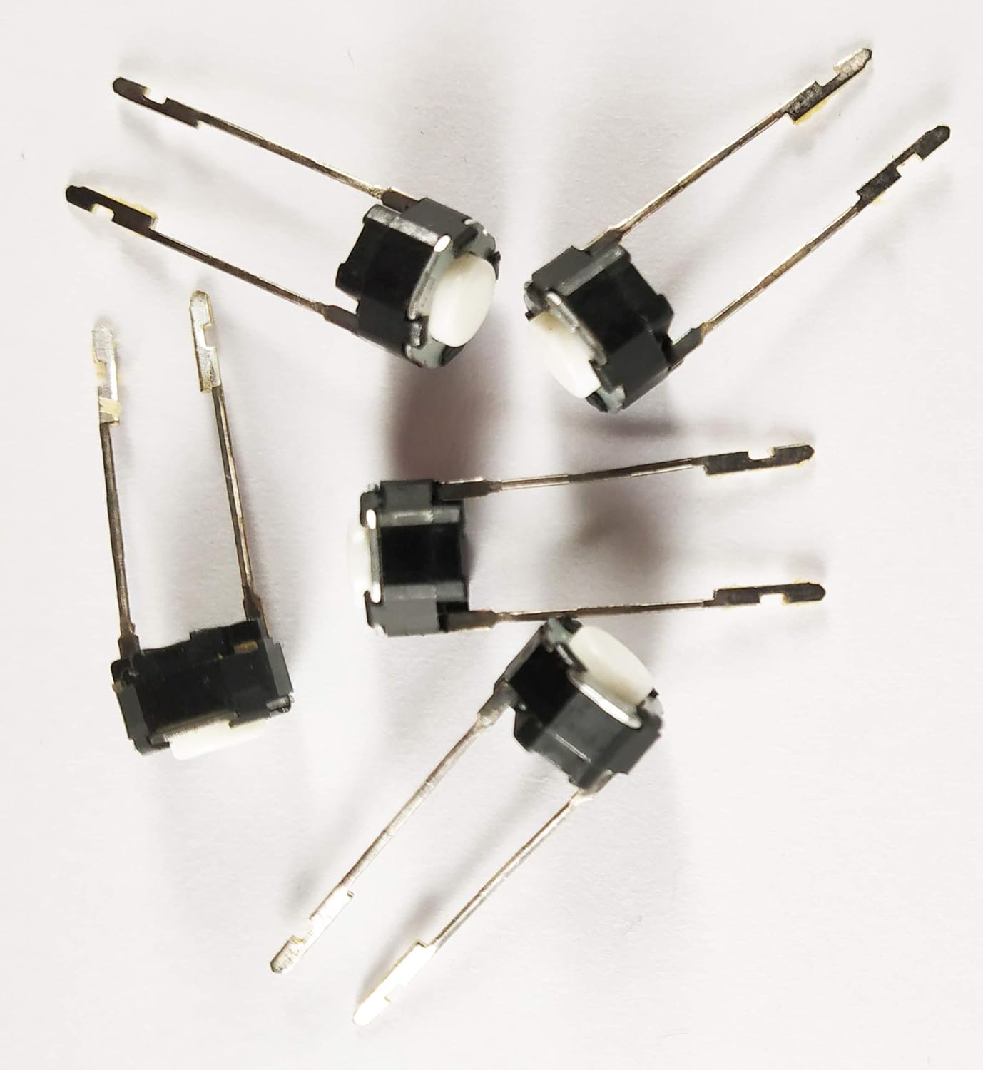 Round Tactile Micro Push Button Switch - shown as a group of five black switches with white circular buttons and two long metal pins each.