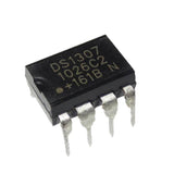 RTC DS1307 IC Real Time Clock - a black, eight-pin integrated circuit chip with white text markings on its top surface.