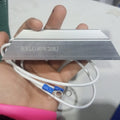 RXLG 80W 20RJ Aluminum Housed Power Resistor | Digilog.pk - the silver metallic heatsink body and attached white wires with blue ring terminals.
