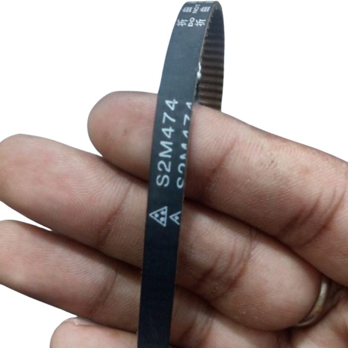 S2M Timing Belt 474 - shown in a close-up held by a hand, is a black rubber toothed belt with the text S2M474 and DO NOT FOLD printed on its surface.