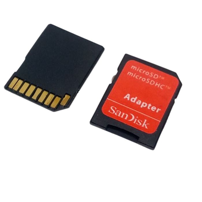 Sandisk SD Card Reader Adapter Without SD Card - shown as a black and red rectangular adapter next to a black SD card with visible gold connector pins.